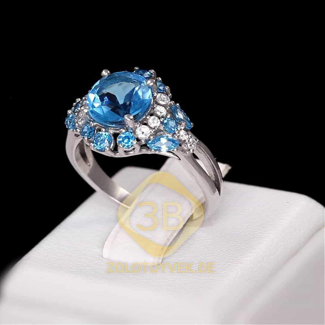 Серебряное кольцо с голубым кварцем и фианитами, покрытие Родий
