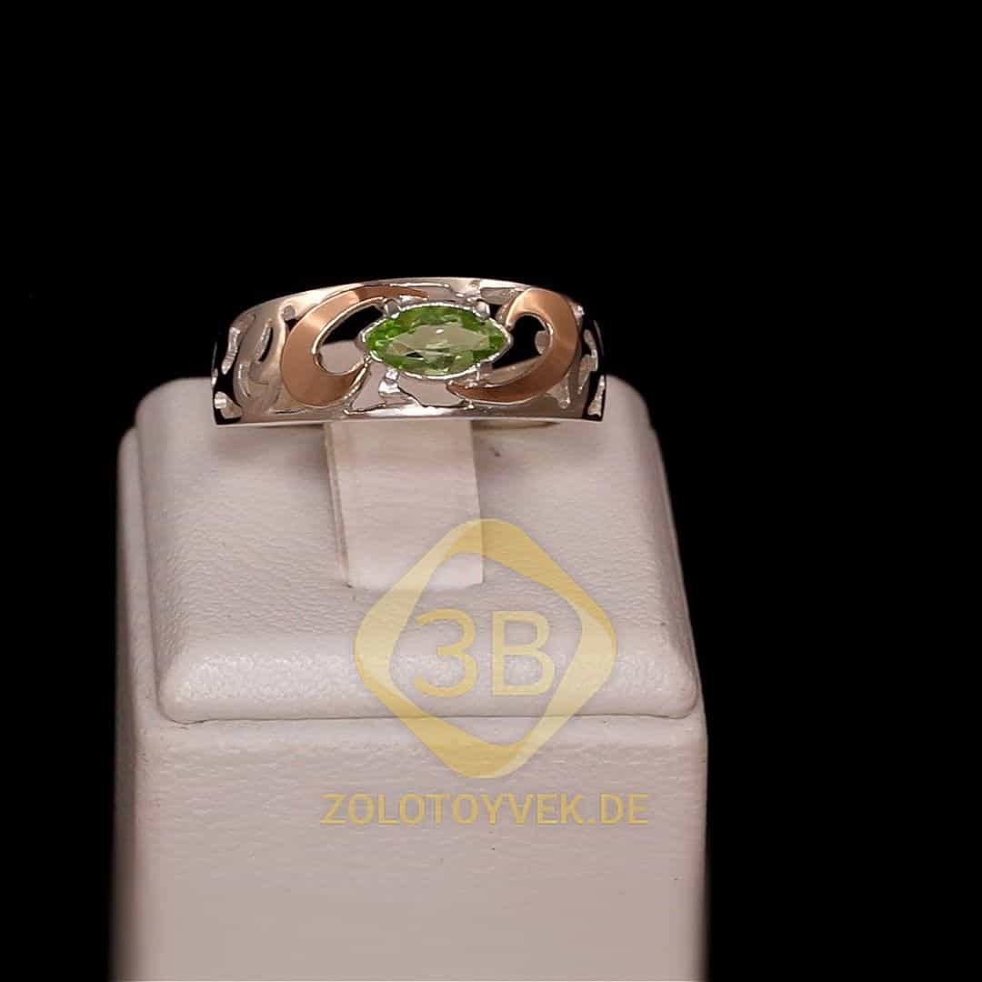 Серебряное кольцо со вставками золота и хризолитом