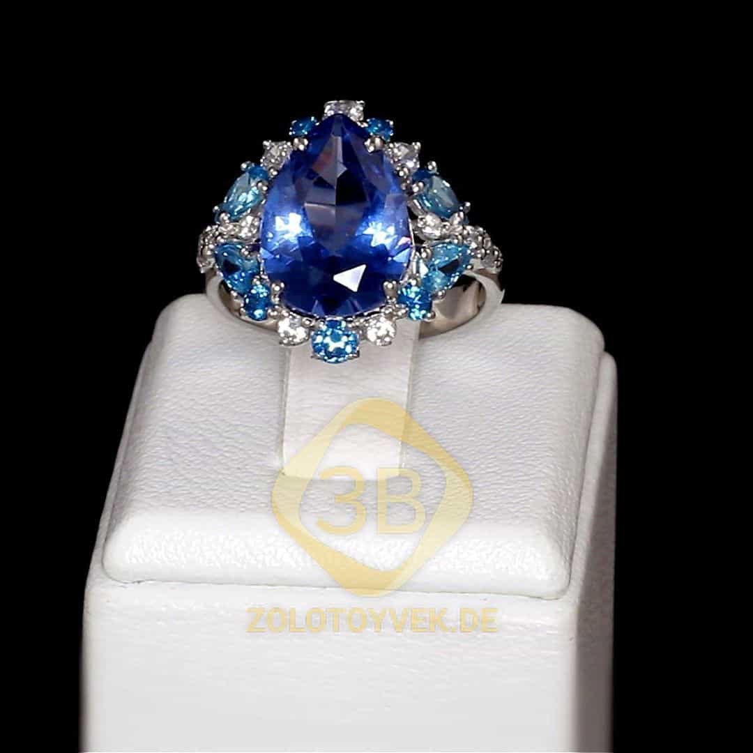 Серебряное кольцо с кварцем  London Blue и фианитами, покрытие Родий