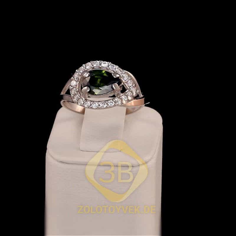 Серебряное кольцо со вставками золота, хризолитовым бриллианитом и фианитами,покрытие Родий