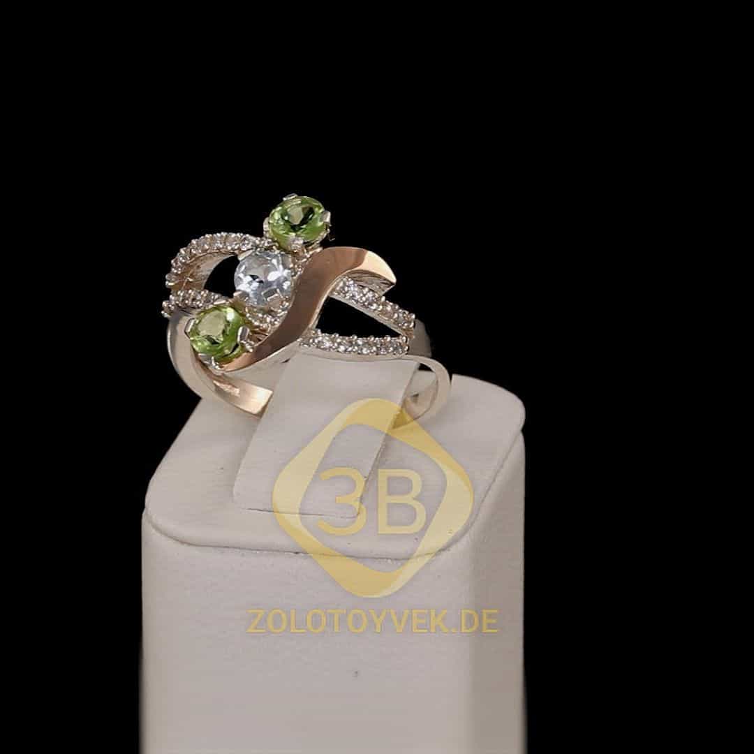 Серебряное кольцо со вставками золота, топазом, хризолитом и фианитами, покрытие Родий