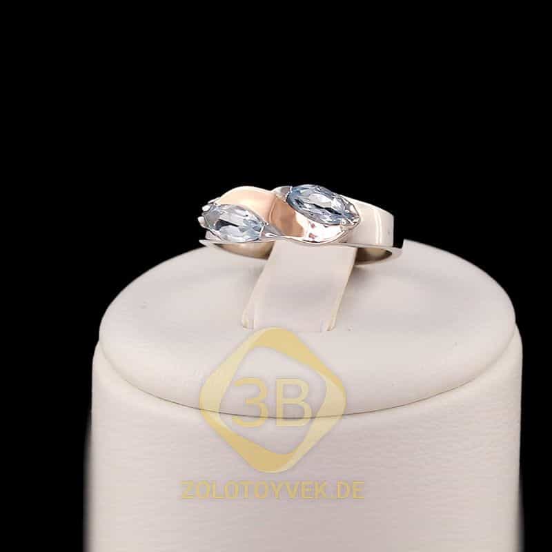 Серебряное кольцо со вставками золота и голубым топазом, покрытие Родий