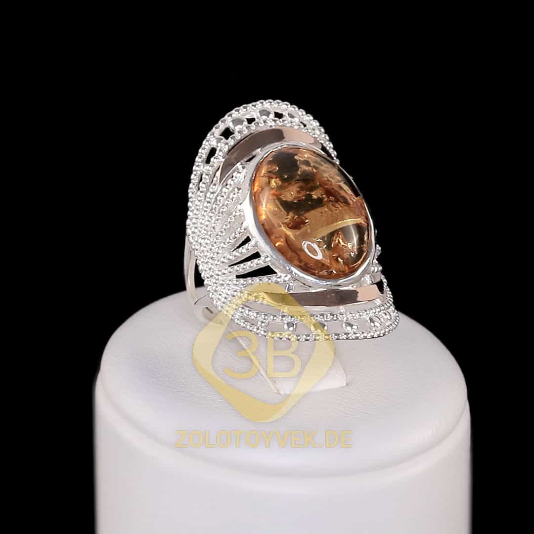 Серебряное кольцо с золотом и янтарем
