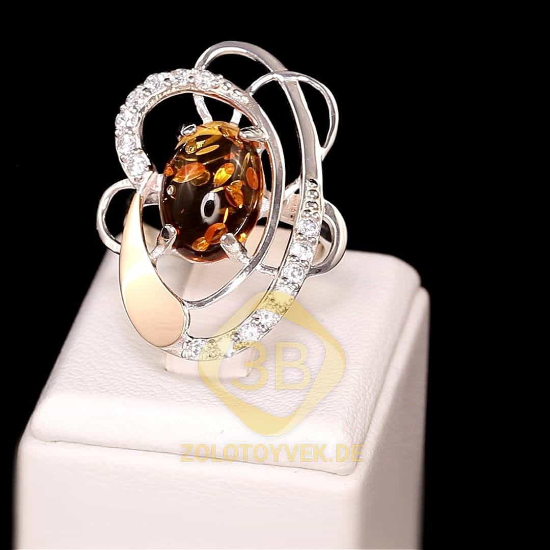 Серебряное кольцо со вставками золота, им. янтаря и фианитами, покрытие родий