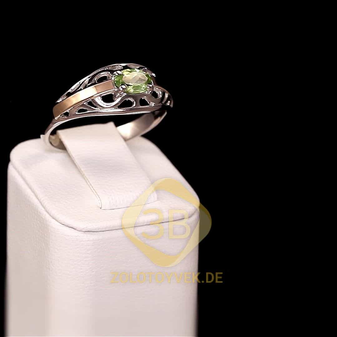 Серебряное кольцо со вставками золота и хризолитом, покрытие родий