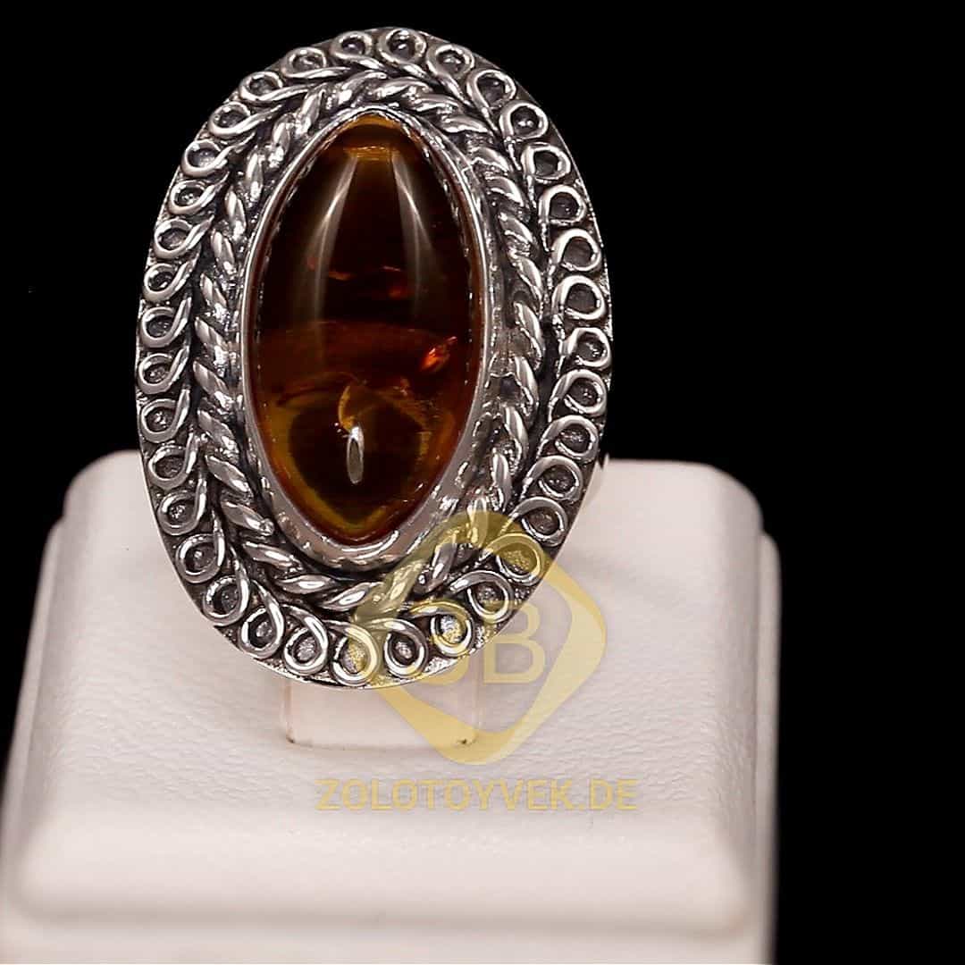 Кольцо из черненого серебра с янтарем, покрытие родий