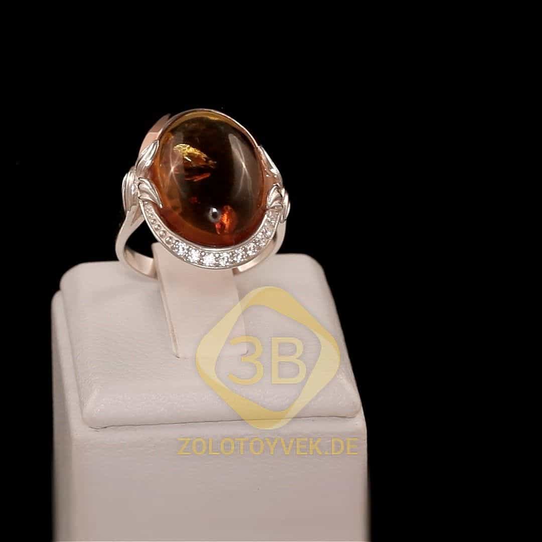 Серебряное кольцо со вставками золота, янтарем и фианитами, покрытие родий