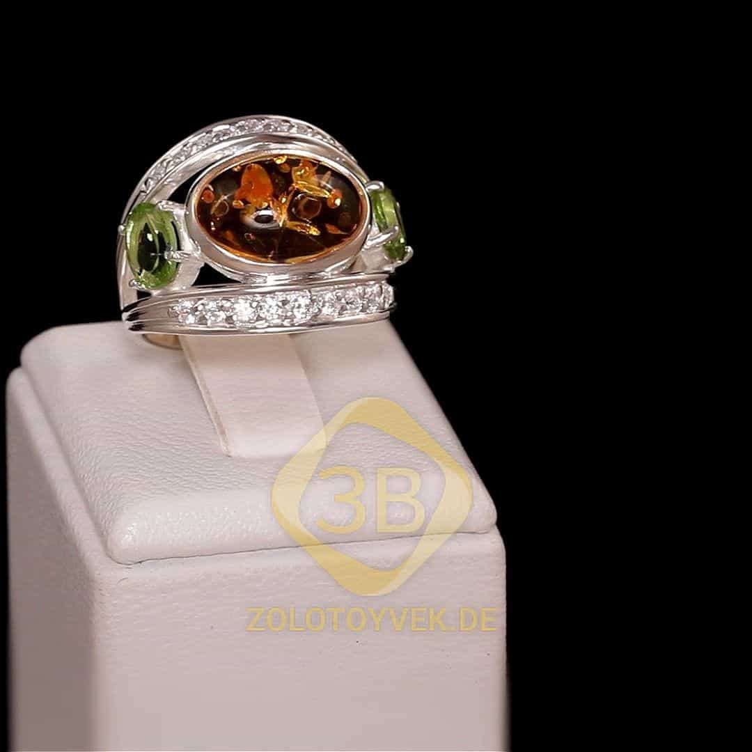 Серебряное  кольцо ,с им.янтаря и  хризолитом покрытие родий