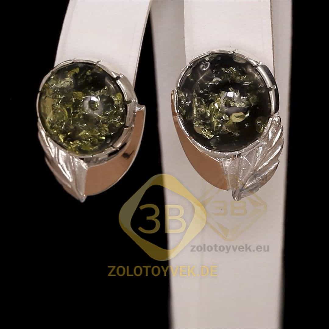 Серебряные серьги со вставками золота и им. зеленым янтарем