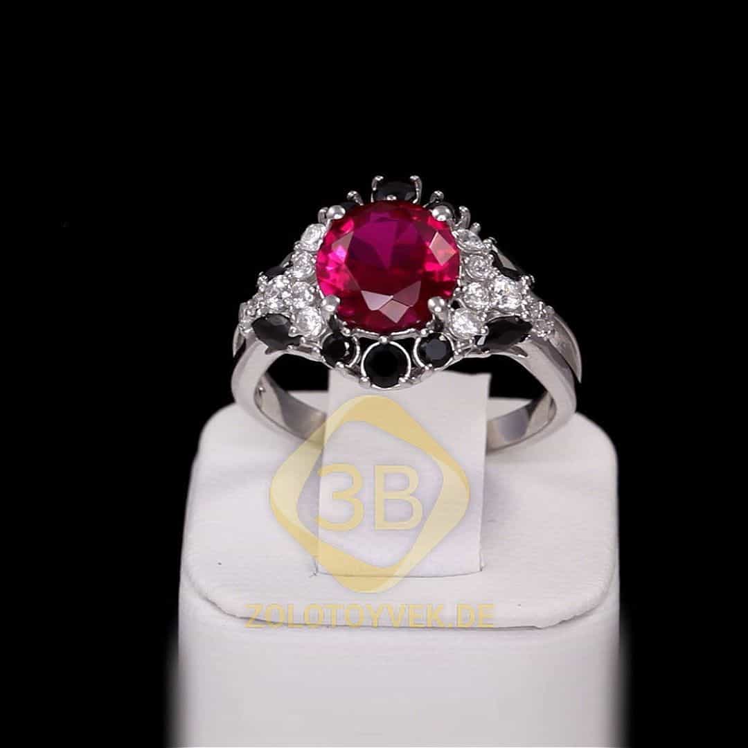 Серебряное кольцо с гидротермальным рубином и фианитами, покрытие Родий