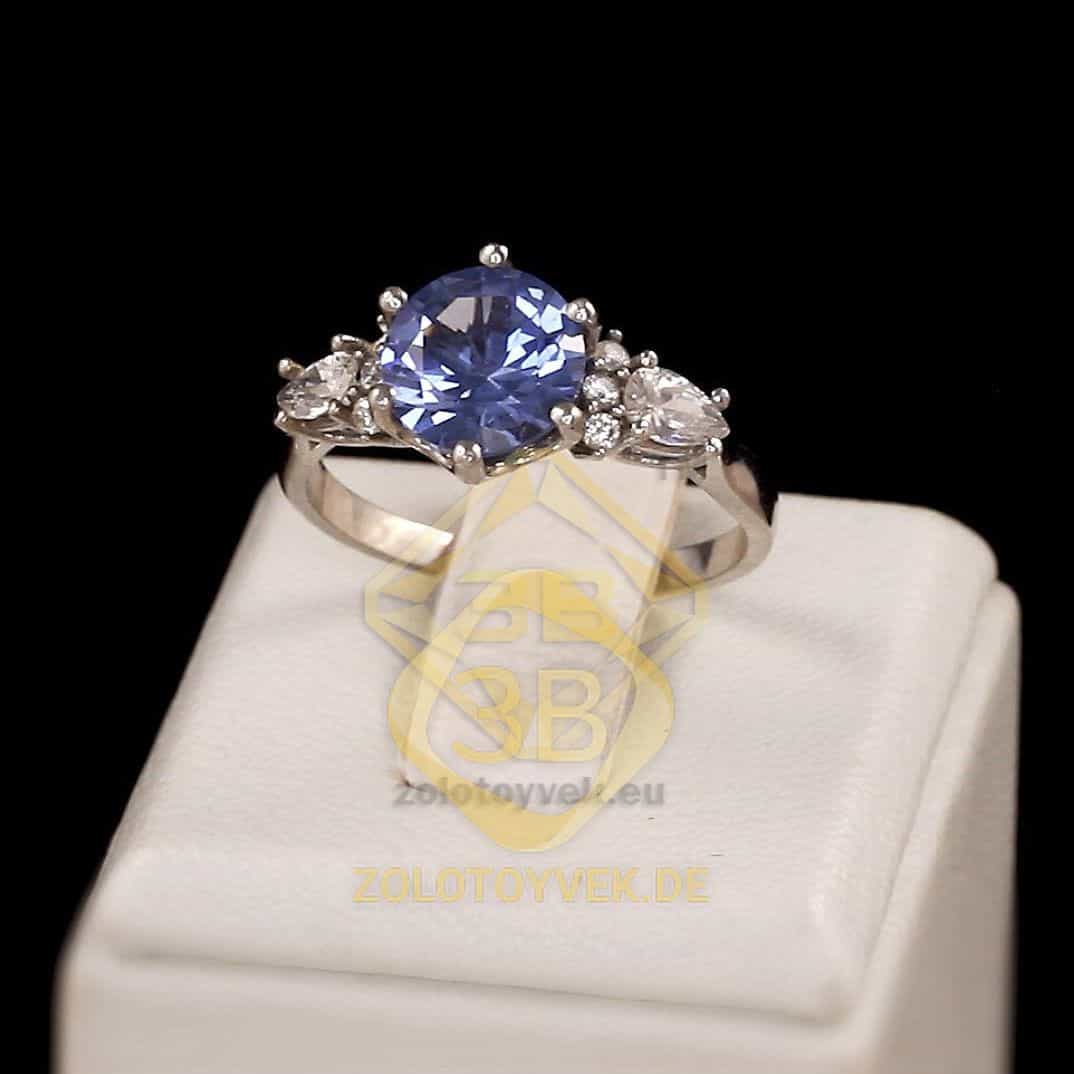 Серебряное кольцо с кварцем London Blue и фианитами, покрытие Родий