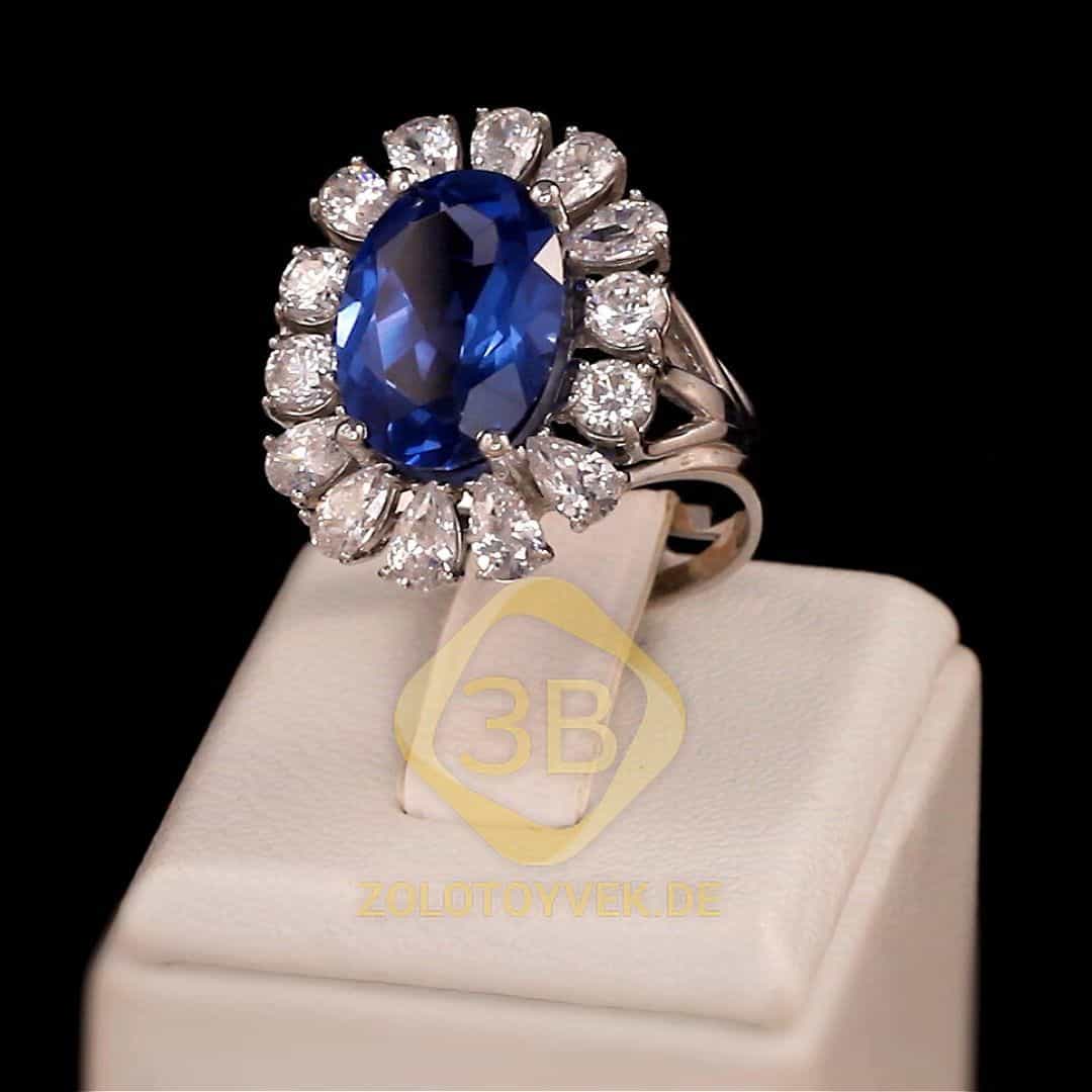 Серебряное кольцо с кварцем London Blue и фианитами, покрытие Родий