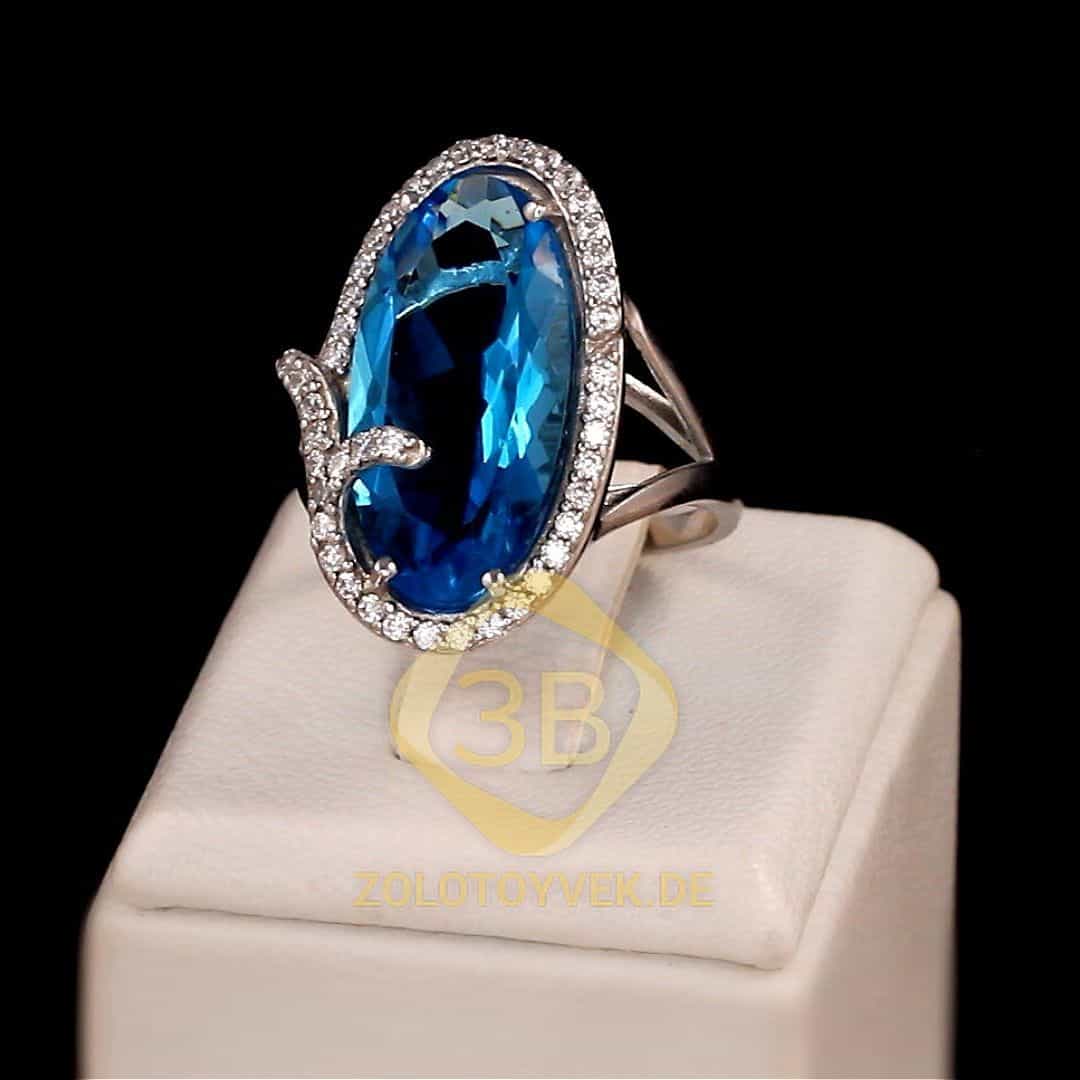 Серебряное кольцо с голубым кварцем и фианитами, покрытие Родий