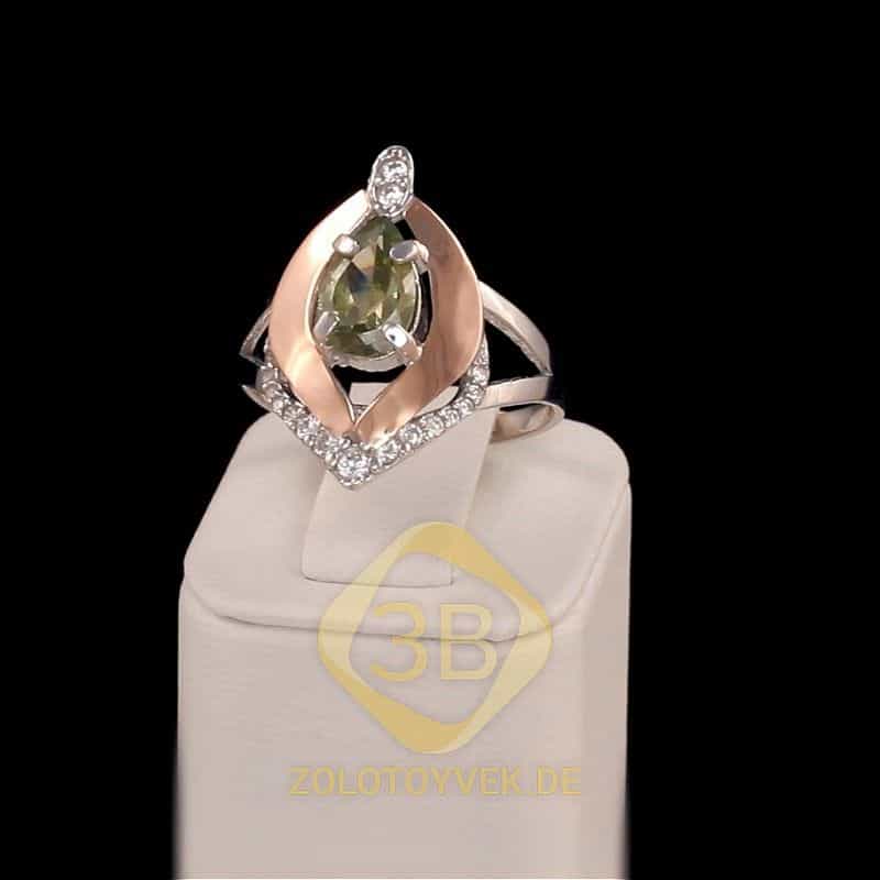 Серебряное кольцо со вставками золота, хризолитовым бриллианитом и фианитами,покрытие Родий