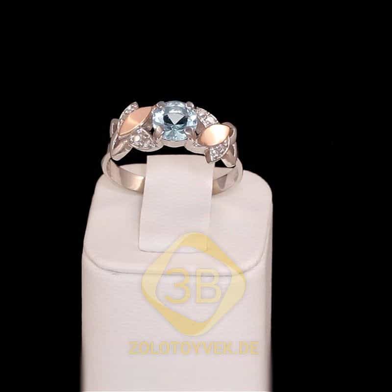 Серебряное кольцо со вставками золота, топазовым бриллианитом и фианитами,покрытие Родий