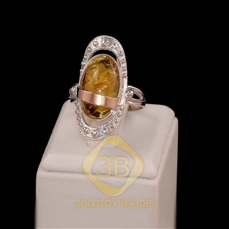 Серебряное кольцо со вставками золота, им. янтаря, покрытие Родий