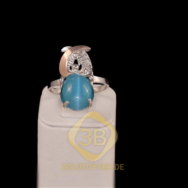Серебряное кольцо со вставками золота, голубым улекситом и фианитами, покрытие Родий