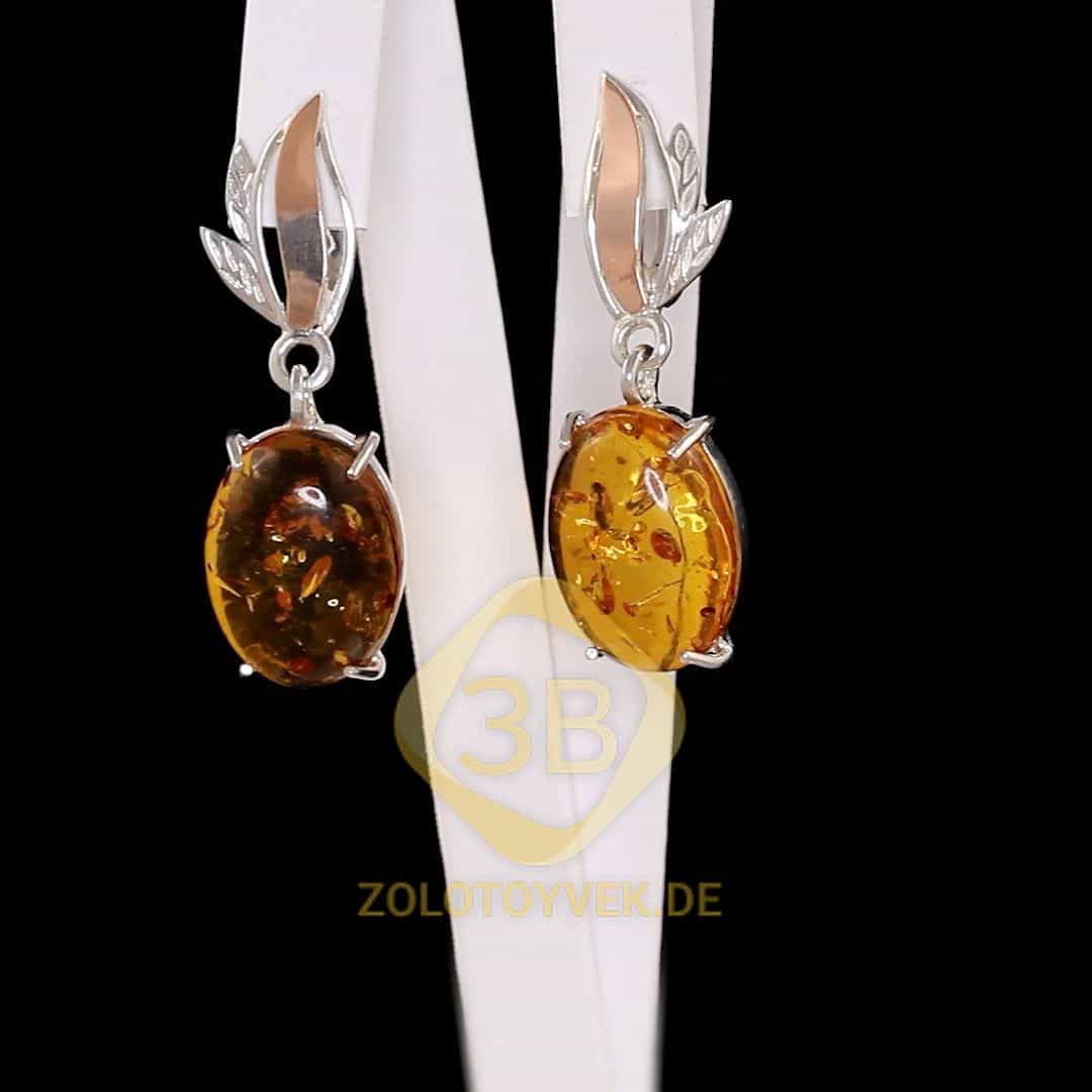 Серебряные серьги со вставками золота и им. янтаря, покрытие Родий