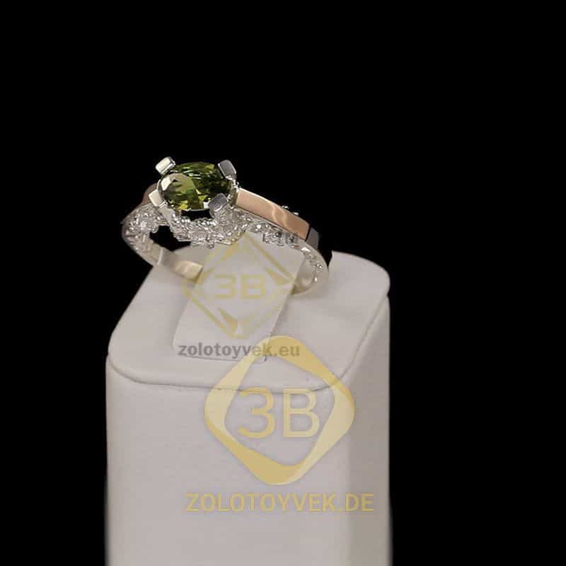 Серебряное кольцо со вставками золота, хризолитовым бриллианитом и фианитами, покрытие Родий
