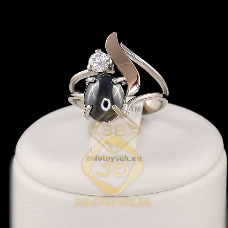 Серебряное кольцо со вставками золота, им. гематитом и фианитом, покрытие Родий
