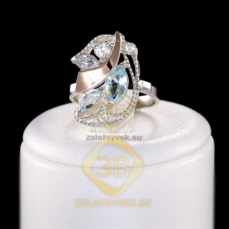 Серебряное кольцо со вставками золота, топазом и фианитами, покрытие Родий