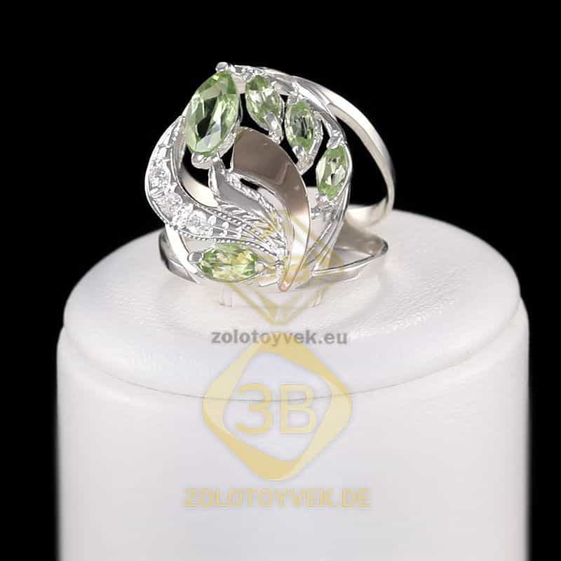 Серебряное кольцо со вставками золота, хризолитом и фианитами, покрытие Родий