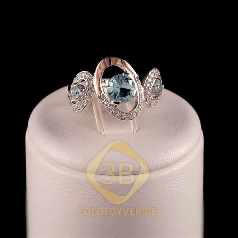Серебряное кольцо с золотом, альпинитом London Blue и фианитами