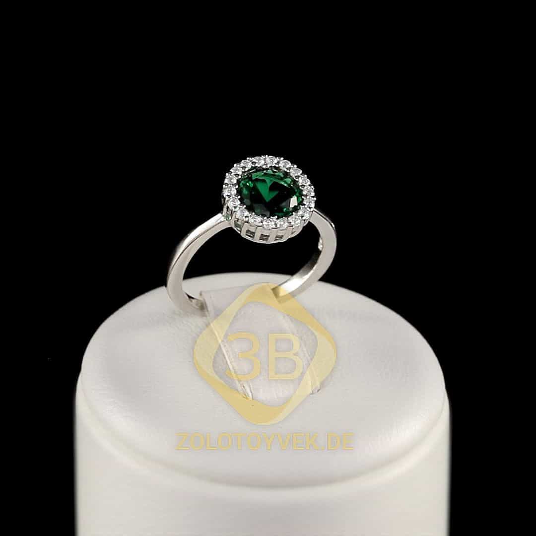 Серебряное кольцо с зеленой шпинелью и фианитами