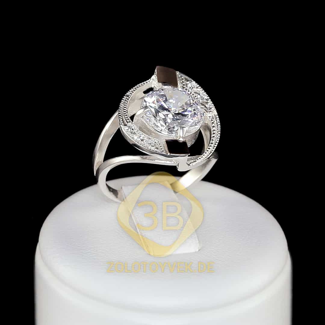 Серебряное кольцо с золотом бриллианитом и фианитами
