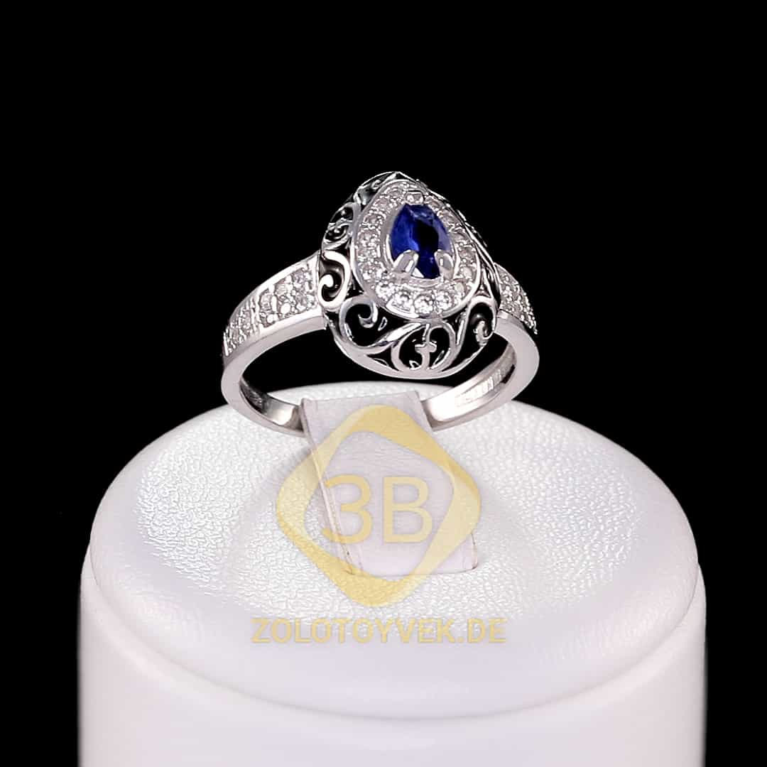 Серебряное кольцо с сапфиром, эмалью и фианитами