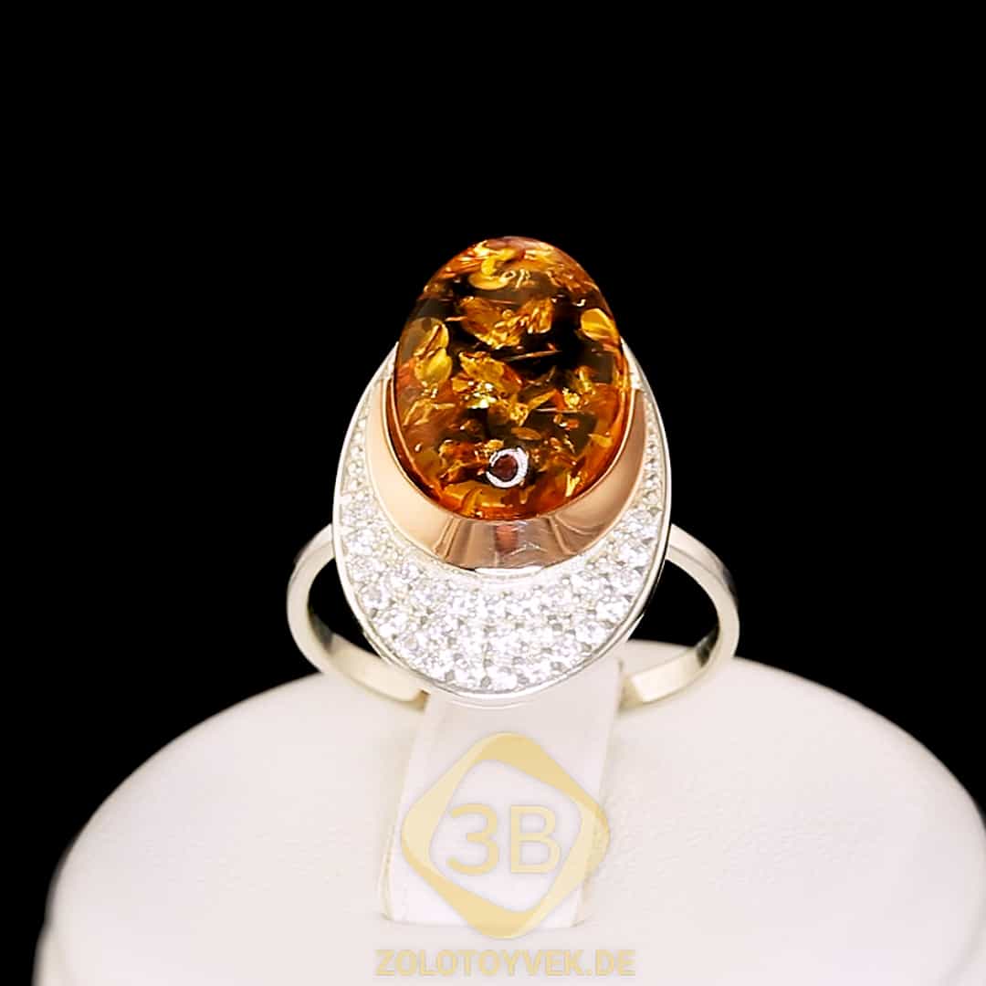 Серебряное кольцо с золотом, янтарем и фианитамми