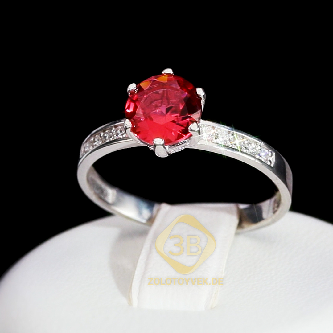 Серебряное кольцо с рубиновым альпинитом и фианитами