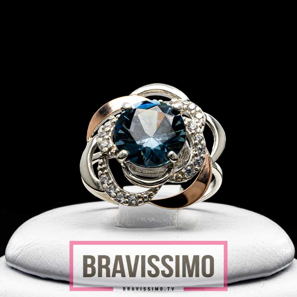 Серебряное кольцо с золотом, топазом London blue и фианитами