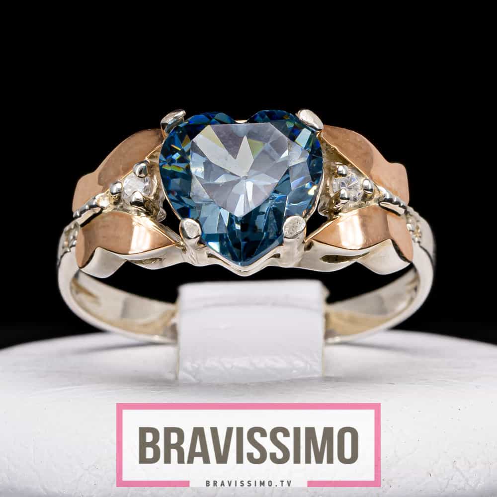 Серебряное кольцо с золотом, топазом London blue и фианитами