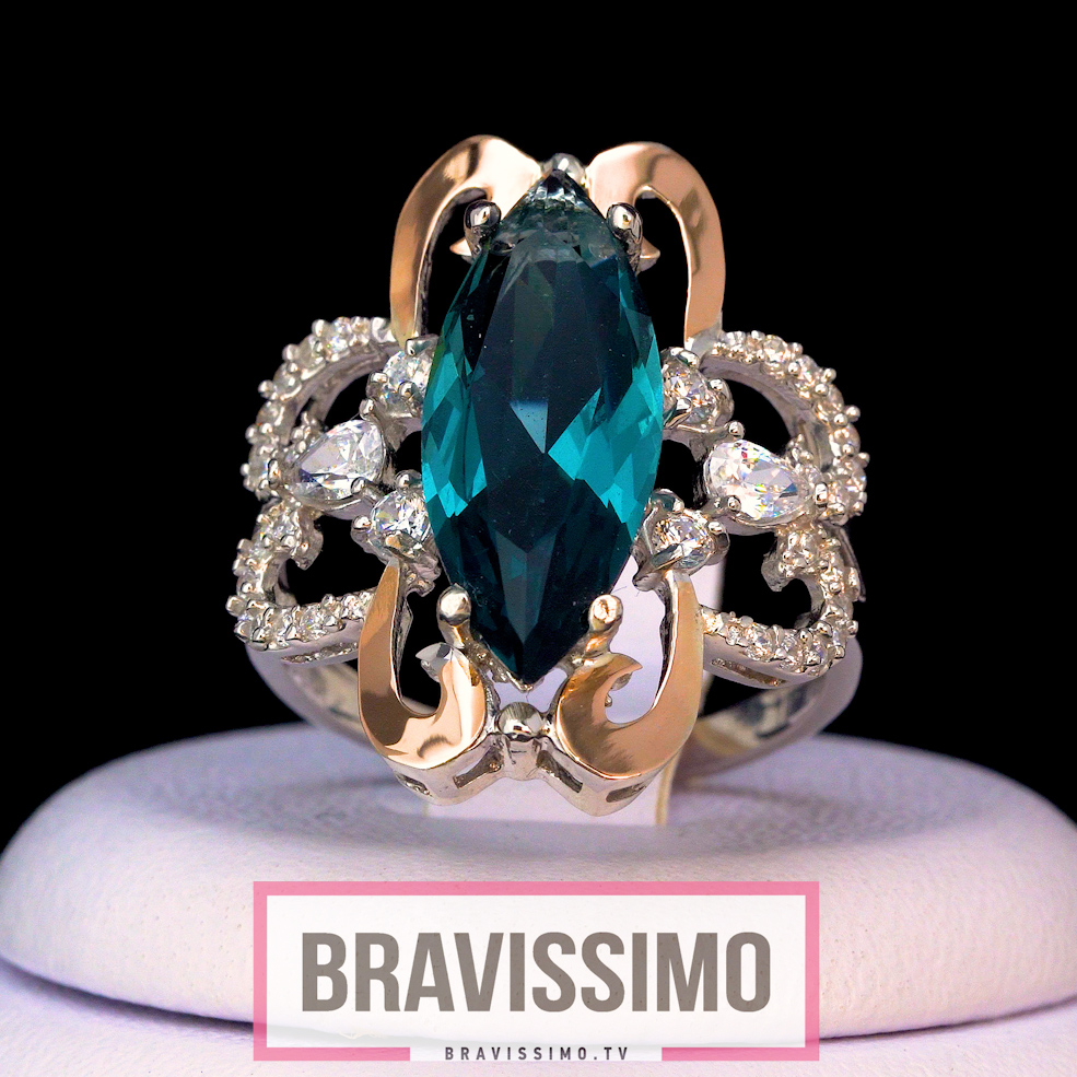 Серебряное кольцо с золотом, топазом London blue, бриллианитом и фианитами