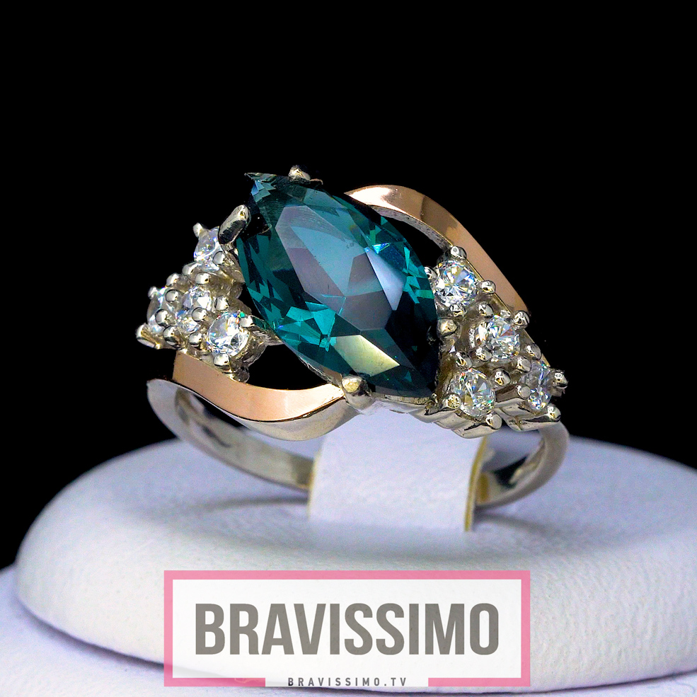 Серебряное кольцо с золотом, топазом London blue и бриллианитами