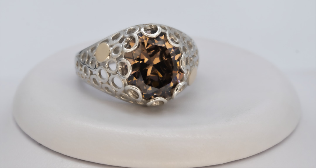Серебряное кольцо с золотом и раухтопазом